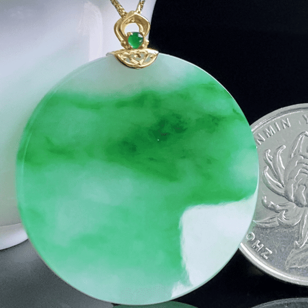 Perfect Natural Myanmar Icy Floating Green Jadeite Wu Shi Pai pendant 32mm in 18K gold.