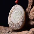 Perfect Natural Hetian Jade "Zodiac Dragon" pendant, 45mm, masterfully carved.