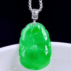 Close-up of exquisite 18K gold setting and rich vibrant green color on Lotus Leaf Jadeite Pendant.