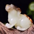 Perfect Natural Hetian Jade Zodiac Dog handpiece, 67mm, carved from Xinjiang seed material.