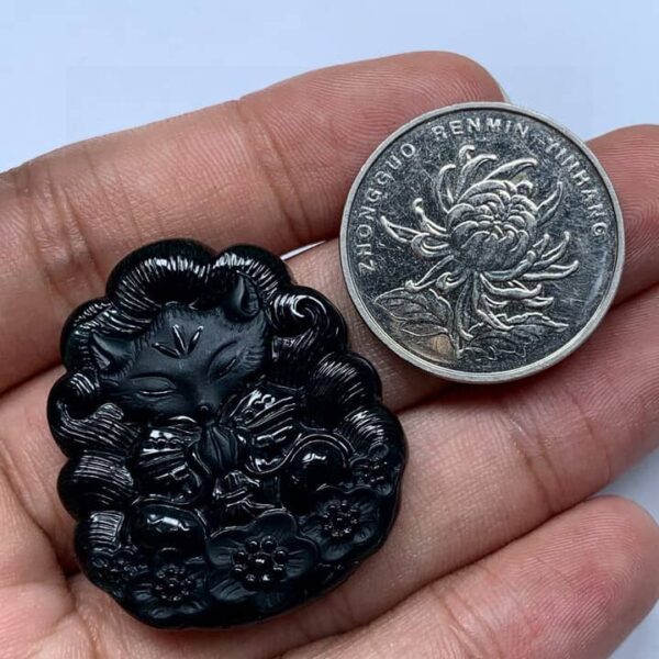 Perfect Natural Ink Jadeite Nine-Tailed Fox Pendant, showcasing its mysterious black color in normal light.