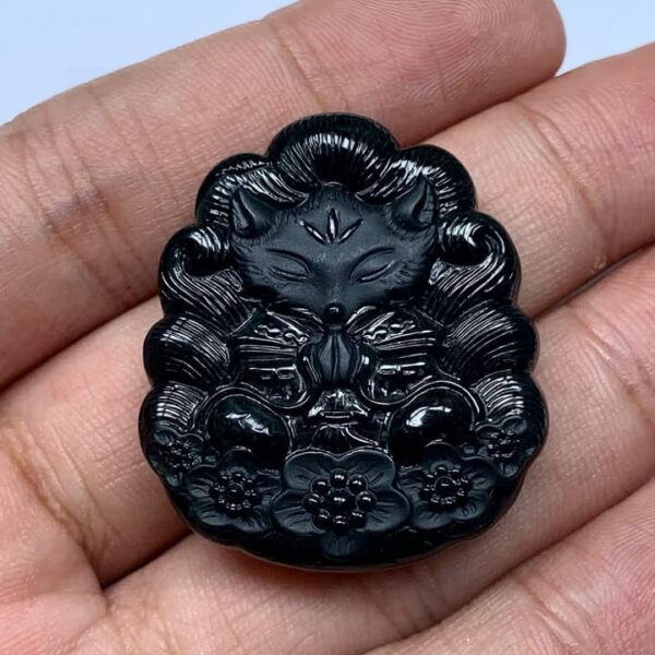 Perfect Natural Ink Jadeite Nine-Tailed Fox Pendant, showcasing its mysterious black color in normal light.