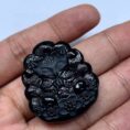Perfect Natural Ink Jadeite Nine-Tailed Fox Pendant, showcasing its mysterious black color in normal light.